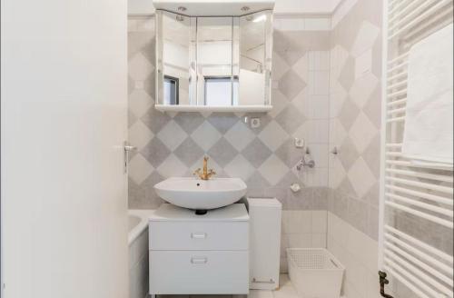 Ένα μπάνιο στο Ferienapartment in 1A Lage