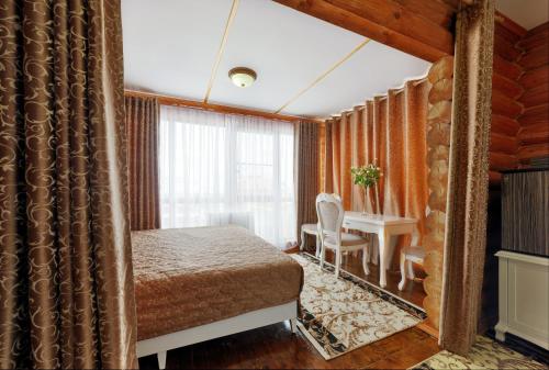 Una habitación en Hotel Hutorok