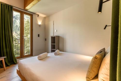 Postel nebo postele na pokoji v ubytování Le Nevada - Duplex T4 Proche Centre