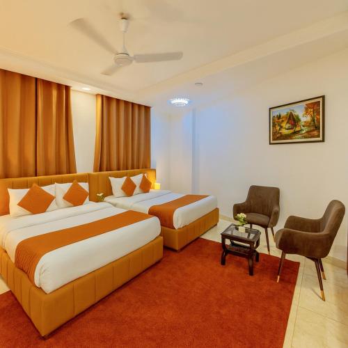 Ένα ή περισσότερα κρεβάτια σε δωμάτιο στο Hotel The Casa Grand - A Four Star Luxury Hotel in Amritsar