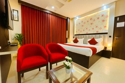 Ένα ή περισσότερα κρεβάτια σε δωμάτιο στο Hotel The Casa Grand - A Four Star Luxury Hotel in Amritsar