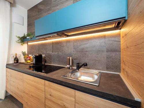 a kitchen with a sink and a counter top at Bella Vista Hostel in Frasso Sabino