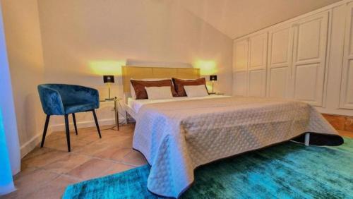 En eller flere senge i et værelse på Domus Dea