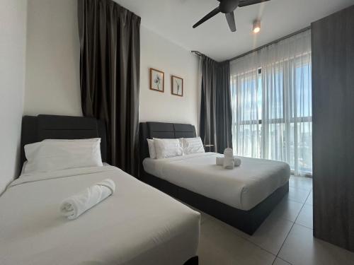 Postel nebo postele na pokoji v ubytování SeaView Premium Family Suite 3B2R