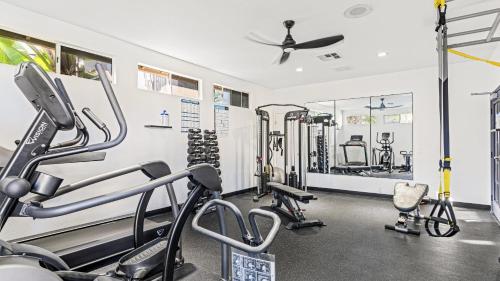 a gym with several treadmills and cardio machines at Close to Beach w Patio Resort Amenities The Point at Corniche by AvantStay in Dana Point