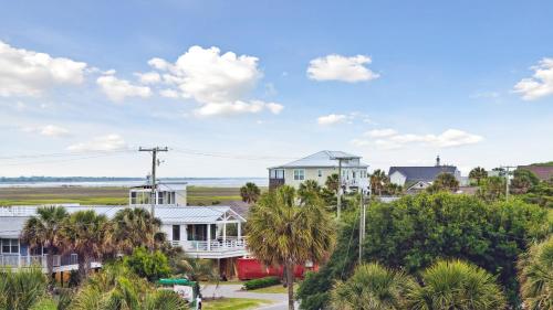 a view of a town with palm trees and houses at Oceanfront w Pool Panoramic Deck Views 5BDR Folly Ocean Breeze by AvantStay in Folly Beach