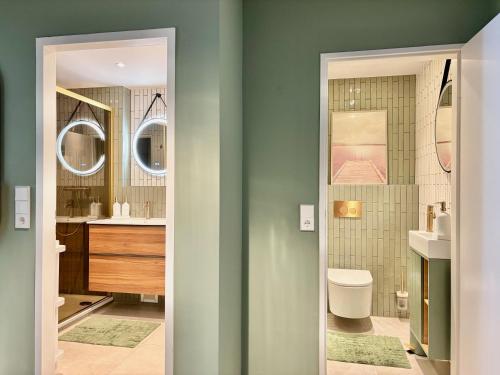 Ванная комната в Snug Stays 8 - ruhige Toplage Seeblick Design-Wohnung I 3-Zimmer I zentral
