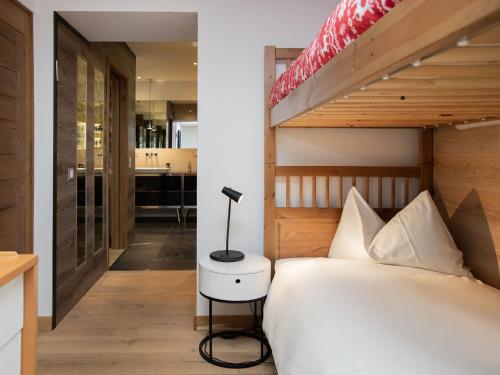 Postel nebo postele na pokoji v ubytování Apartment Chesa Piz Padella - St- Moritz by Interhome