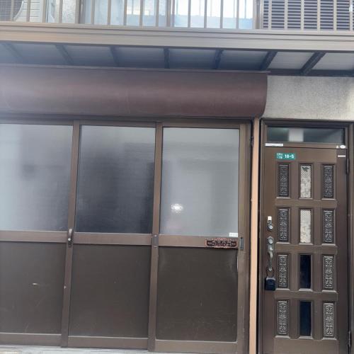 a close up of a door of a building at 东京瑞江独栋直达新宿秋叶原 in Tokyo