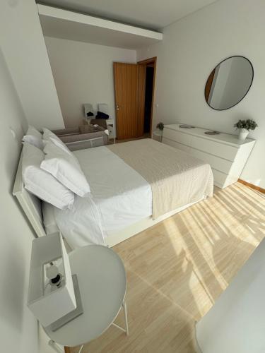 Ένα ή περισσότερα κρεβάτια σε δωμάτιο στο Cosy Home Azores