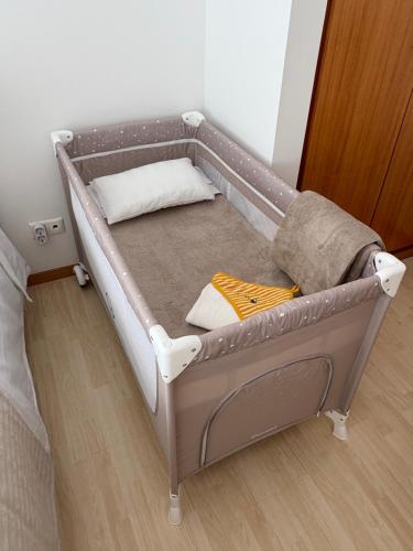 Ένα ή περισσότερα κρεβάτια σε δωμάτιο στο Cosy Home Azores