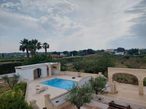 an overhead view of a swimming pool in a house at Villa Coco Monopoli in Monopoli