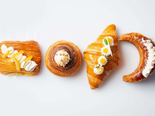a group of three different types of pastries at Sofitel Phnom Penh Phokeethra in Phnom Penh