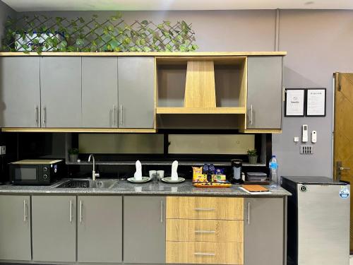 Kuchyň nebo kuchyňský kout v ubytování Asnb Residence F1 - 1BHK