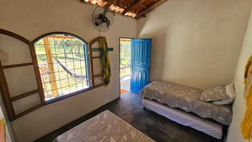 Katil atau katil-katil dalam bilik di Camping Solar da Colina