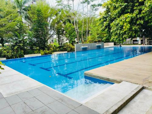 Πισίνα στο ή κοντά στο Matina Enclaves 2 BR near SM Ecoland Davao City