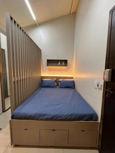 Ένα ή περισσότερα κρεβάτια σε δωμάτιο στο Apartamento Loft 3 próximo ao Shopping