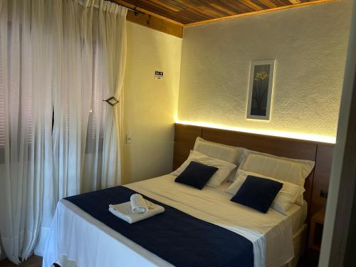 Postel nebo postele na pokoji v ubytování Pousada Unser Haus