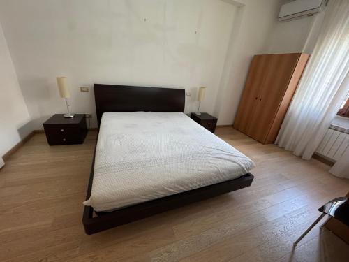 Postel nebo postele na pokoji v ubytování La Kasina al Porto