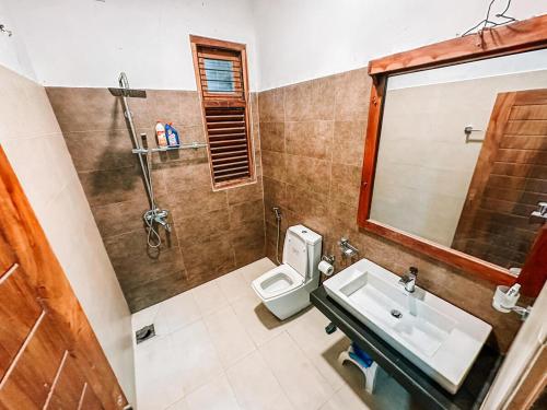 Ένα μπάνιο στο SRI VILLA Galle