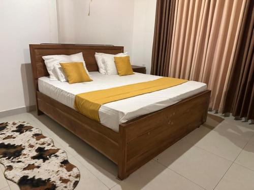 Ένα ή περισσότερα κρεβάτια σε δωμάτιο στο SRI VILLA Galle