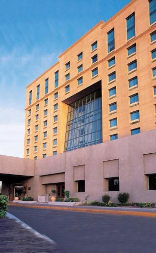 a large building with a lot of windows at Fiesta Inn Ciudad Juarez in Ciudad Juárez
