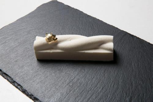 a piece of white soap sitting on a black napkin at Live Aqua Ciudad de Mexico Bosques de las Lomas in Mexico City