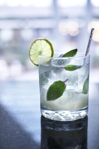 a glass of water with ice and a lime at Fiesta Americana Mexico Toreo in Mexico City
