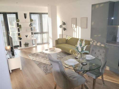 a living room with a table and a couch at Beautiful, home from home, one bed stay in Olton