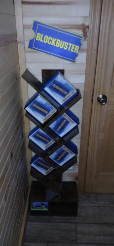 a bunch of blue boxes on a stair case at The Cabin Kingdom Hot tub Fire Pit in Blairsville