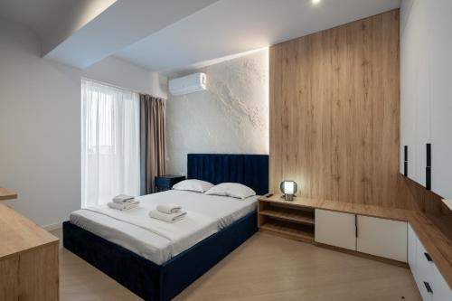 Postel nebo postele na pokoji v ubytování The Cortina One 1BR Apartment for 4