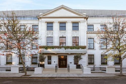a white building with a front door at Town Hall Hotel - Shoreditch in London