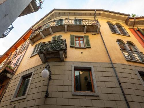 a building with a balcony on the side of it at Apartment San Vittore by Interhome in Intra