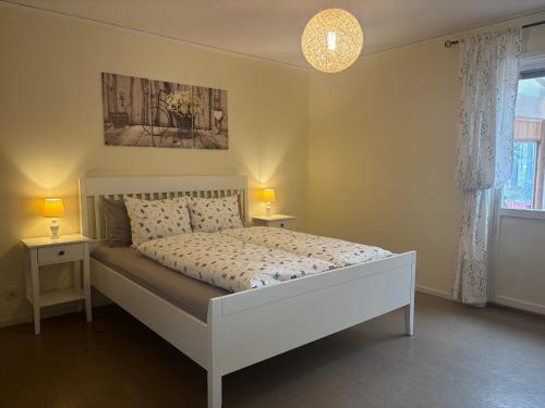 Ένα ή περισσότερα κρεβάτια σε δωμάτιο στο Syllis Hus