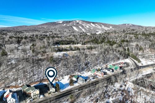 an aerial view of a train traveling on a track at Ludlow A Go Go in Ludlow