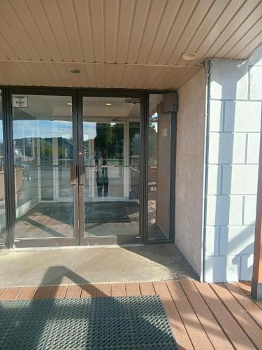 an entrance to a building with glass doors at London residency inn in London