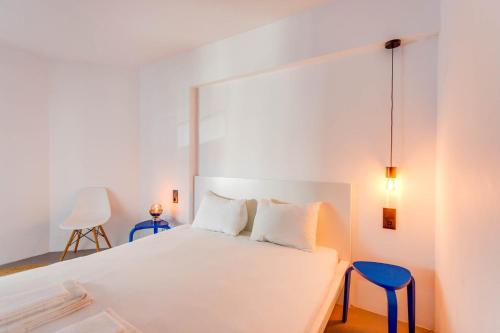 En eller flere senge i et værelse på GuestReady - Ocean breeze in Costa da Caparica