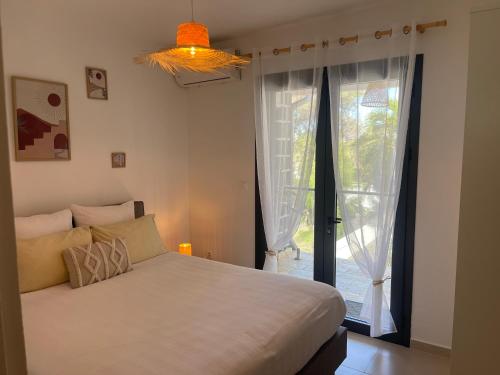 Postel nebo postele na pokoji v ubytování Résidence Les Alizées