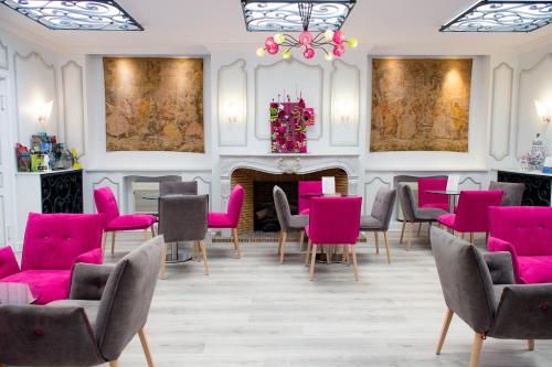 Coin salon dans l'établissement Kyriad Hotel Tours Centre