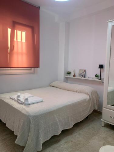 Giường trong phòng chung tại Vivienda al Sur del Sur