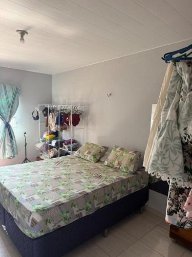 a bedroom with a bed in a room at Apartment rental for COP30 in Belém