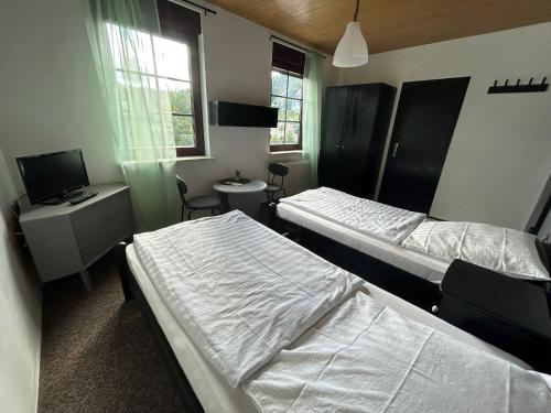 Postel nebo postele na pokoji v ubytování B&B Concordia