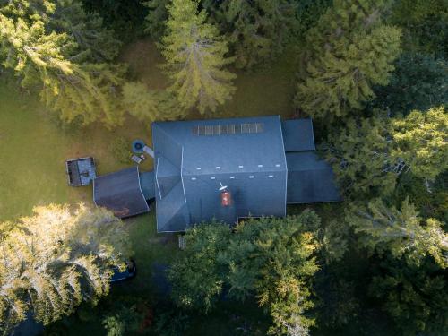 an overhead view of a large building in a forest at Chalet Látky in Látky