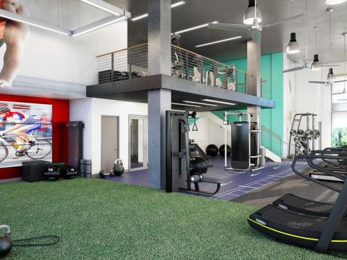 a room with a gym with a treadmill and weights at Blueground Milpitas pool nr Ed R Levin Park SFO-2021 in Milpitas