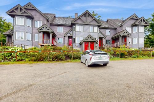a car parked in front of a large house at Grammy Jay Getaway #V363 in Jay