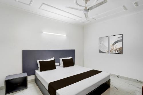 Postel nebo postele na pokoji v ubytování Hotel O Dk Hotel