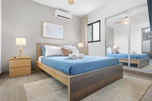 Katil atau katil-katil dalam bilik di NOK Cozy 1 BR Apartment in Punta Cana