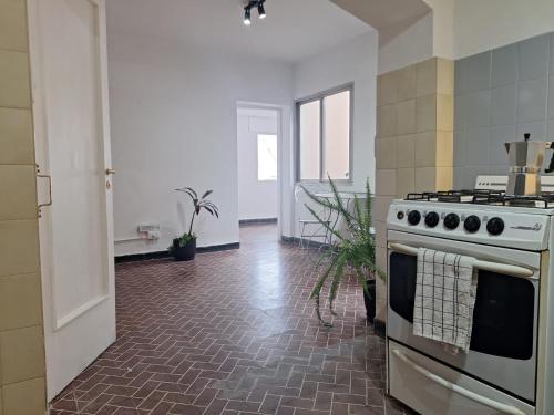 Køkken eller tekøkken på 4 Personas - 2 Cuartos - Aire A Split & Wifi - Cochera