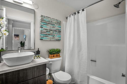 a bathroom with a sink and a toilet and a shower at Heart of La, Walk to everything!! in Los Angeles