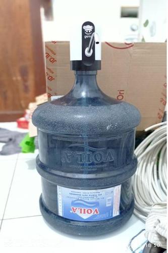 a large bottle of water sitting on top of a counter at Kost 48 Surabaya in Surabaya